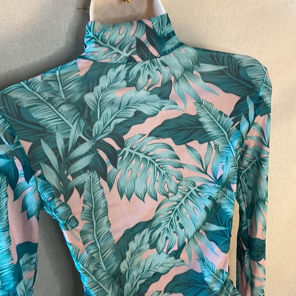 be the center of attention in this stunning sheer/floral print bodysuit - Picture 6 of 7